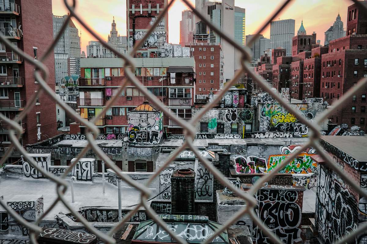 grey photo of brown concrete city buildings at daytime new york
